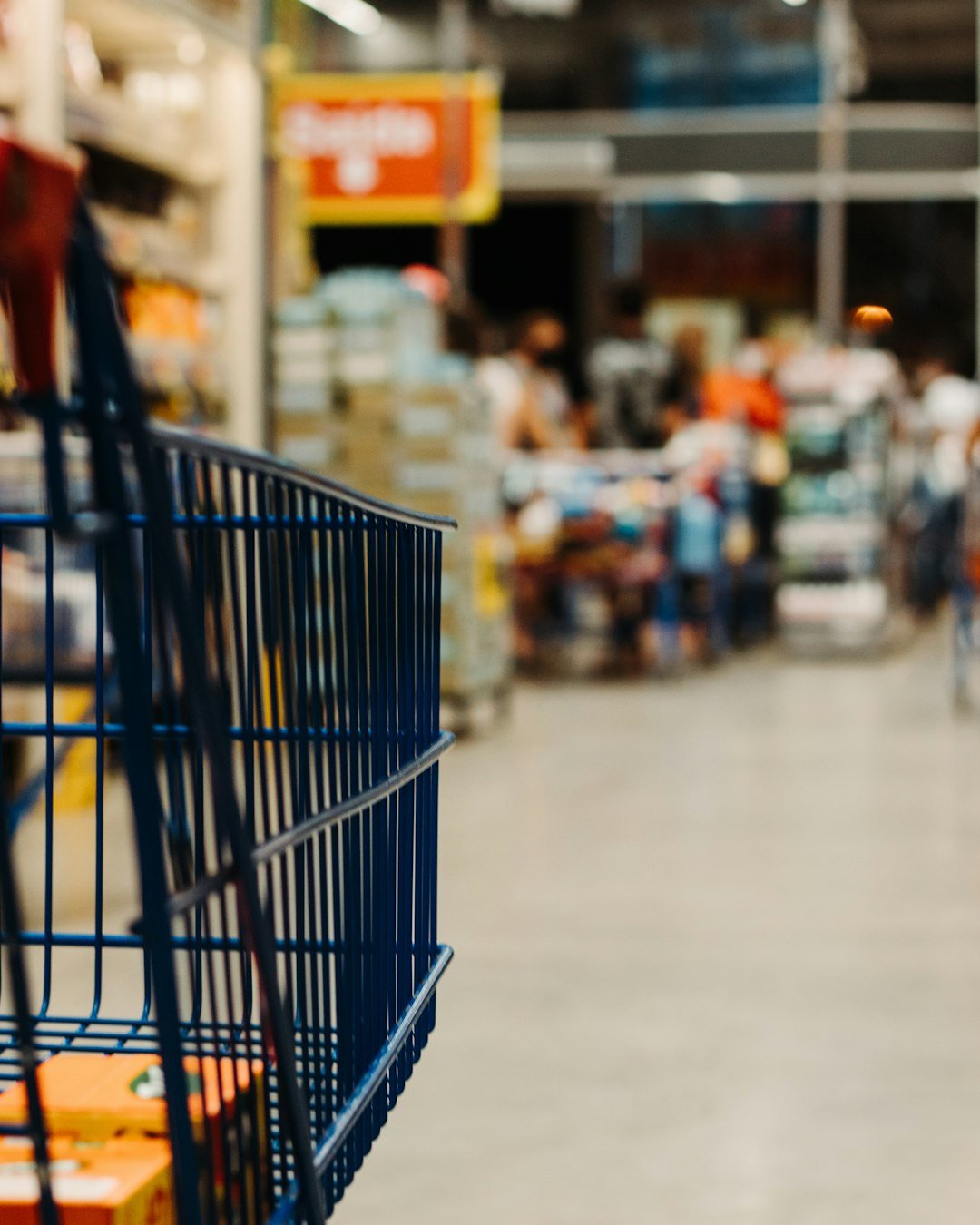 Shopping trolley in a grocery aisle
